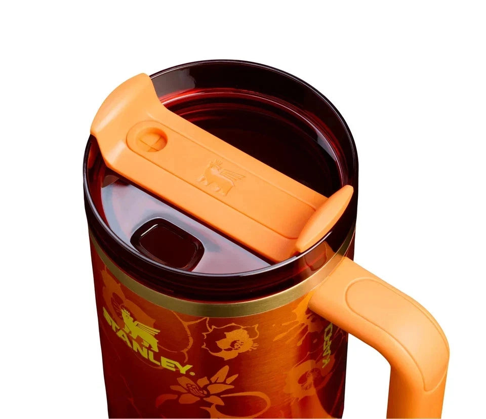 The Stanley 1913 x KAROL G 40 oz Quencher H2.O FlowState Tumbler